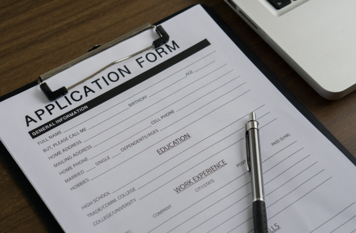 An SIA licence application form being completed